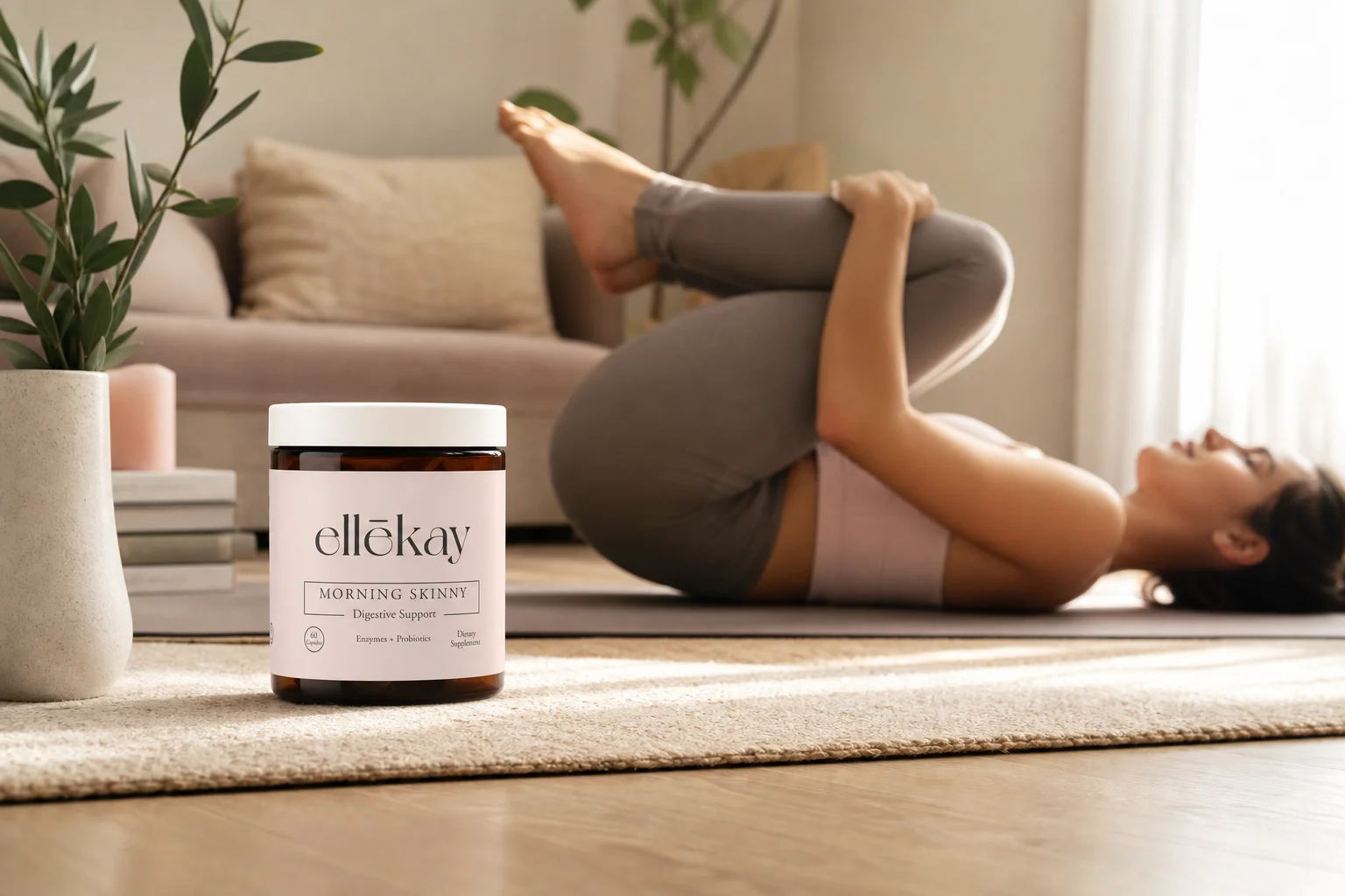 Woman doing gentle knees-to-chest yoga pose on a soft mat in a cozy warmly lit living room, evening digestive movement routine