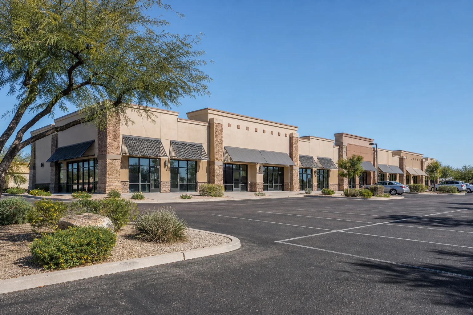 Small multi tenant retail strip center storefronts along a Gilbert Arizona commercial corridor
