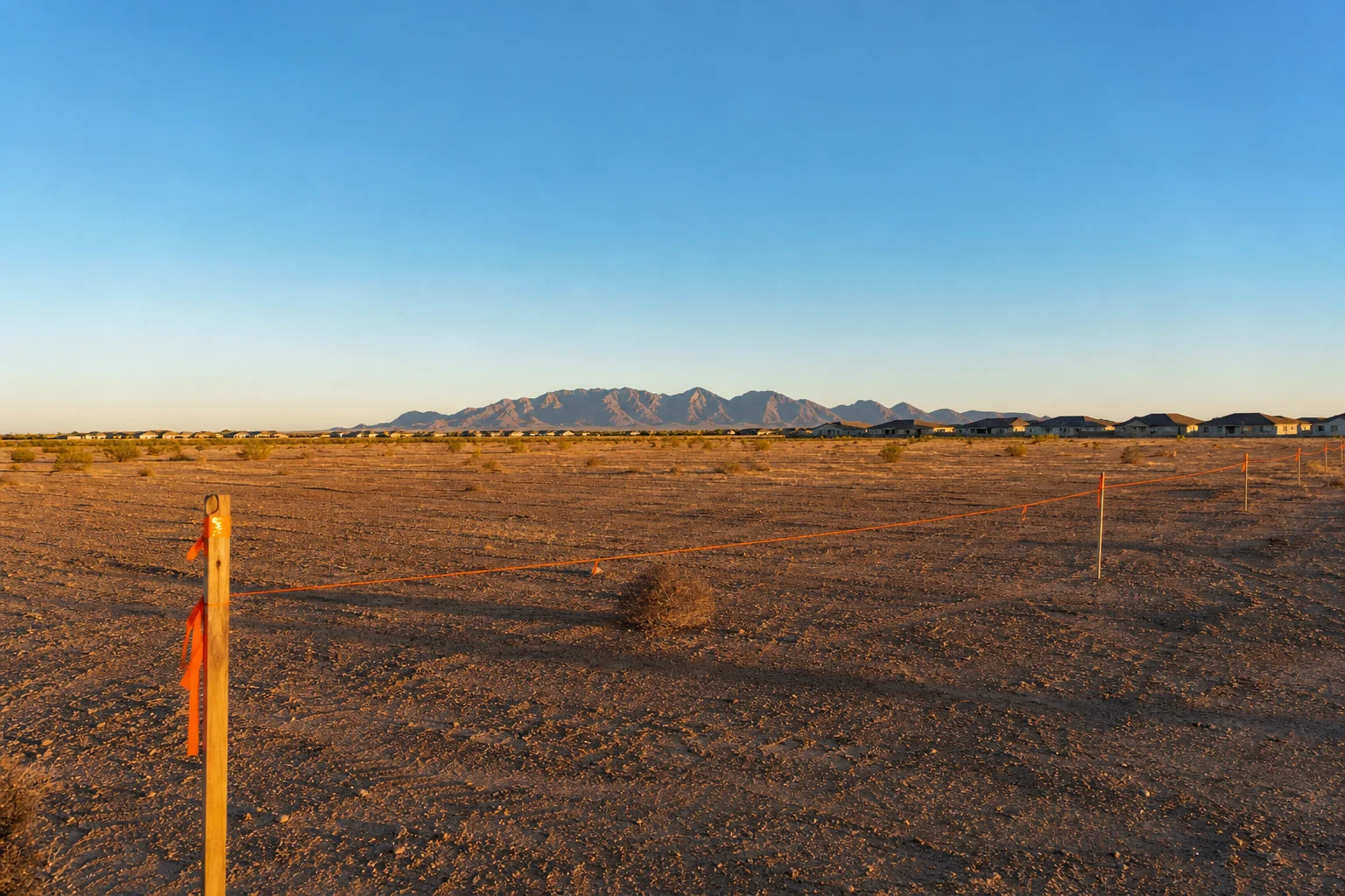 Raw desert land parcel in Queen Creek Arizona staked for entitling and rezoning into a buildable site